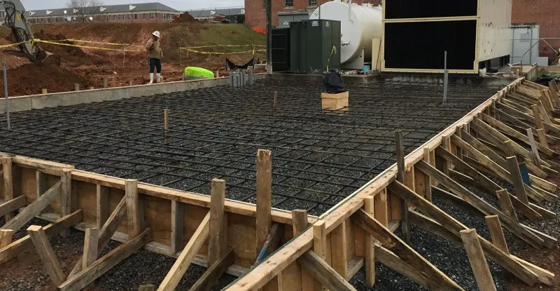 A man is molding concrete