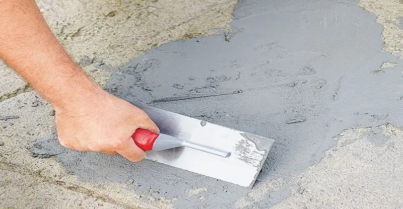 Repairing cracks in concrete