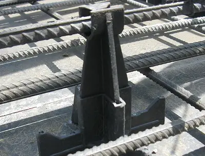 The double spacer is placed between the reinforcements